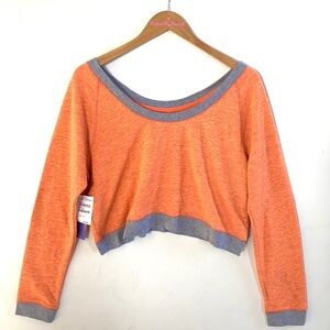Unity long sleeve sweatshirt crop top,‎ Size L, NWT in color Peach Glow